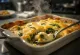 Travessa de bacalhau com natas dourado e gratinado com espinafres