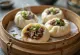 Baozi branco cozido a vapor recheado com carne de borrego