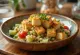 Tofu assado servido com salada de quinoa