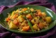 Avial com cenoura, servido com ricos vegetais e especiarias